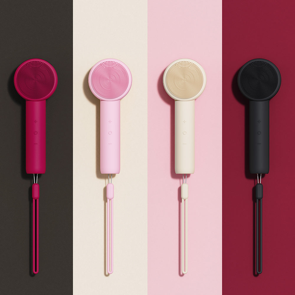 Liorae Cléa Sonic Facial Cleanser in four colours - black, cream, pink, and hot pink