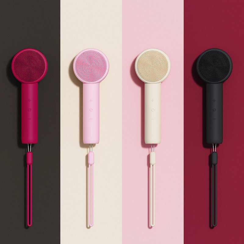 Liorae Cléa Sonic Facial Cleanser in four colours - black, cream, pink, and hot pink