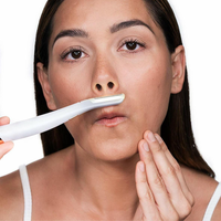 Precision dermaplaning blade and LED illumination